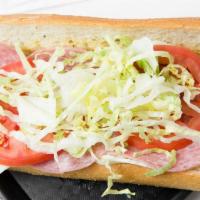Italian Submarine · Genoa salami, mortadella, ham, Provolone, lettuce, tomato, Italian oil served on French bread.