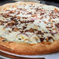 Lg Chicken Alfredo Pizza · House made Alfredo Sauce, mozzarella cheese, smoked chicken thighs, diced red onion and baco...