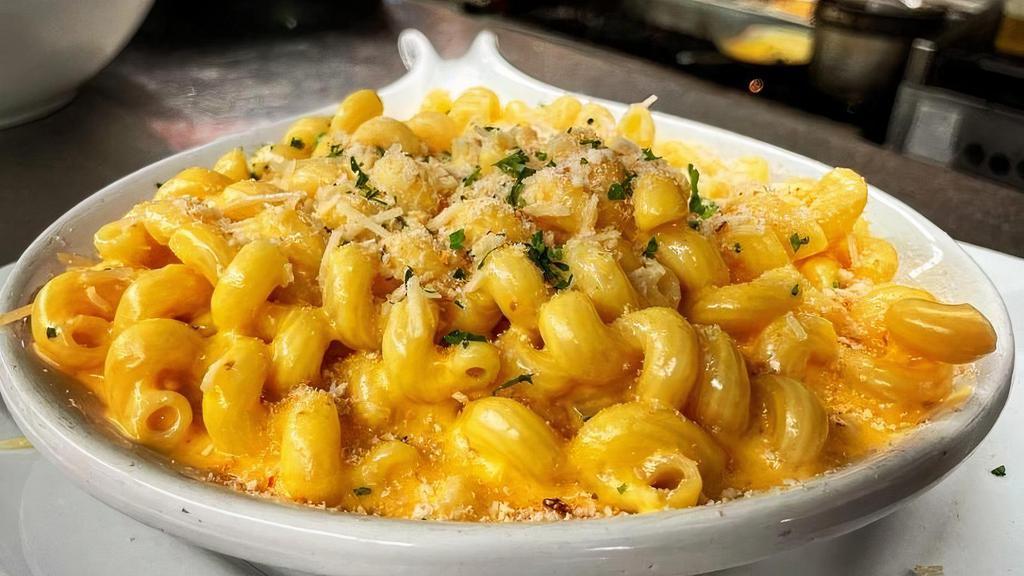 Moe'S Classic Mac N Cheese · 4-Cheese Blend, Heavy Cream all tossed with Cavatappi Noodles and topped with toasted Panko Bread Crumbs.
