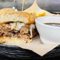 Cheesesteak Sandwich · Thinly sliced Mayslack's roast beef topped with melted Swiss Cheese, Mushrooms and Creamy Ho...