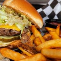 New Brighton Burger · 1/4# patty topped with American Cheese, shredded lettuce, pickles & 1000 Island dressing on ...
