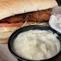 Walleye Sandwich · Breaded Canadian Walleye filet served on a toasted hoagie bun with Lettuce, Tomato and a sid...
