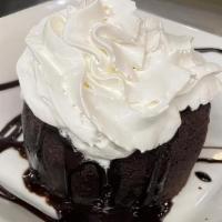 Chocolate Lava Cake · Flourless chocolate torte with a warm molten chocolate center. Served with whipped cream.
