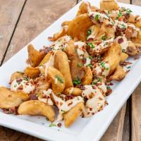 ‘Murca Fries · Beer-battered fries, choice of white cheese or bourbon-barrel beer cheese sauces, bacon, chi...