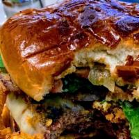 Chipotle Burger · A juicy burger with onion strings topped melted jalapeño Jack cheese and zesty chipotle mayo...