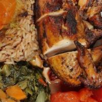 Jerk Chicken Dinner · 1/2 of chicken served with rice and two sides.