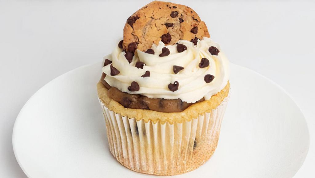 Chocolate Chip Cookie Dough · Our vanilla cupcake mixed with chocolate chips, along with cookie dough in the center, topped with cream cheese frosting, chocolate chips and chocolate chip cookie