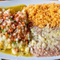 Enchilada Lunch · Soft corn tortilla stuffed with your choice of chicken or beef with enchilada sauce and chee...