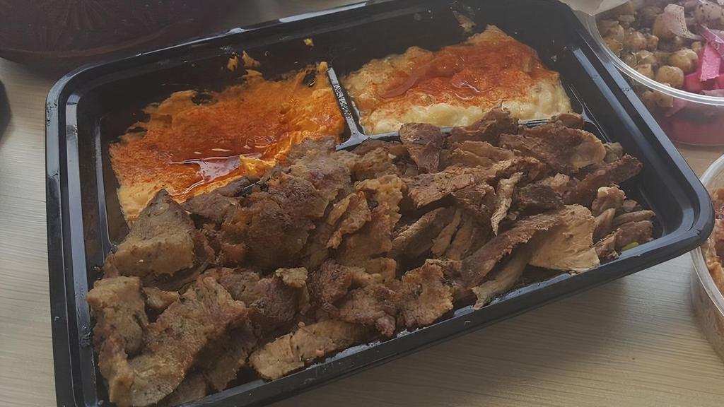 B G Platter · Most popular. Basmati rice topped with steak and chicken shawarma and gyro, falafel, quinoa tabbouleh, hummus or baba ganoush and fresh baked pita. Topped with traditional topping and all 3 sauces on the side.