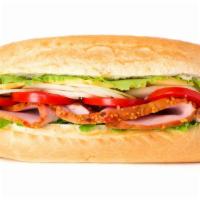 Turkey Sub · Layers of thinly sliced turkey with mozzarella cheese, fresh lettuce and tomatoes with may o...