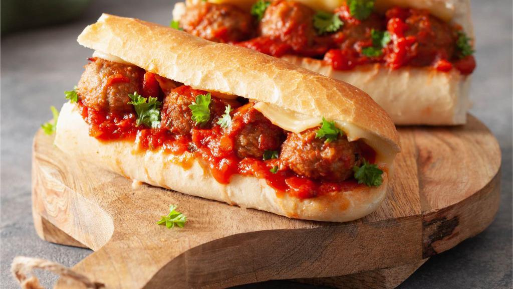 Meatball Sub · Tender, homemade meatballs layered with marinara sauce and melted mozzarella cheese on a soft sub roll.