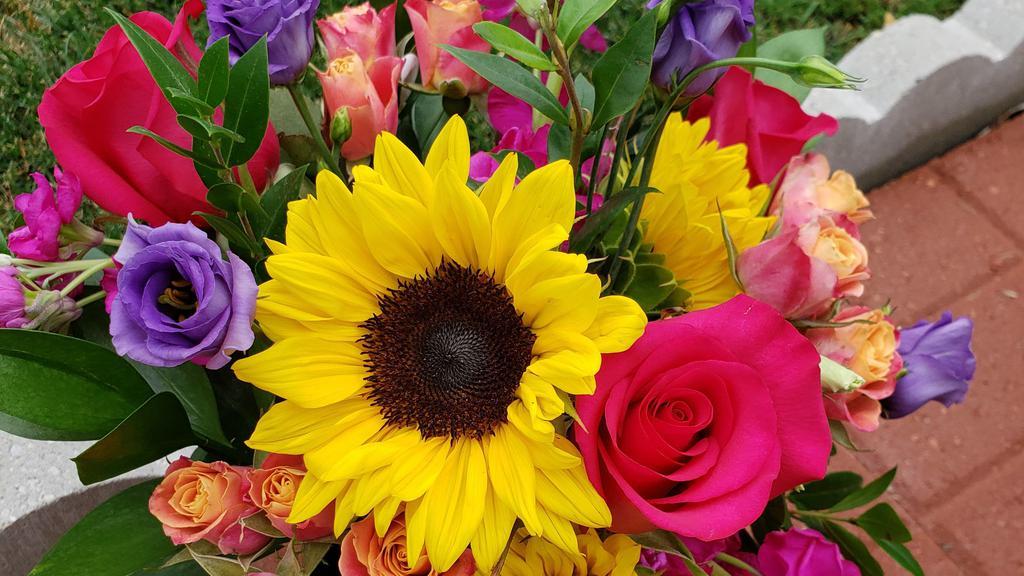 Celebrate · Perfect for any occasion! 
A bright and cheery mix of seasonal flowers arranged in a vase. *Substitutions made to value if necessary* Please include recipients name and a card message in the special instructions!