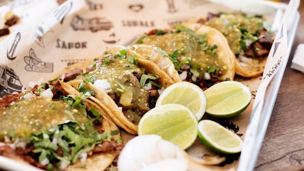 Tacos Street · Choice of meat, topped with onions & cilantro on a corn tortilla with lime. Add tripe or tongue for an additional charge.