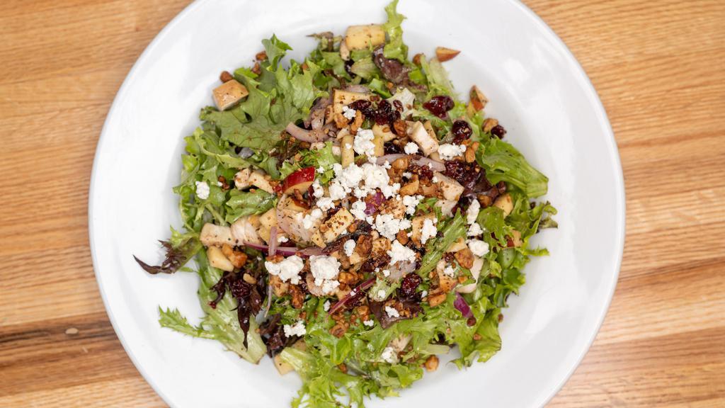 Fromage Bleu · Greens, Roast Chicken, Blue Cheese, Apples, Spiced Walnuts, Dried Cranberries, Red Onion, Balsamic-Romano Vinaigrette.