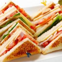 Ultimate Triple Decker Club · Old fashioned smoked ham, turkey, bacon, Swiss cheese, lettuce, tomato, and mayo on your cho...