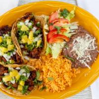 Taco Dinner · 3 Tacos, served with rice & refried beans. Choice your meat