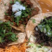 Taco Dinner · 3 Tacos served with refried beans & rice.
Please choice your meat.