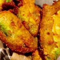 Avocado Fries · Beer-battered avocado slices. Served with habanero mango aioli for dipping.
