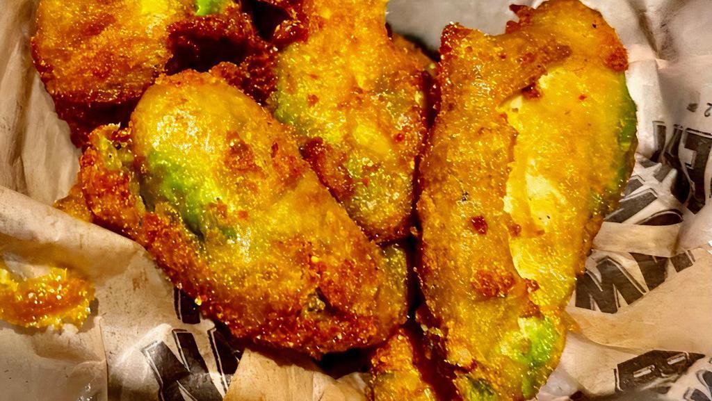 Avocado Fries · Beer-battered avocado slices. Served with habanero mango aioli for dipping.