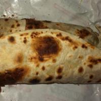 Chimichanga Burrito · Deep fried regular burrito, until the tortilla is flaky, and golden brown. Topped with enchi...