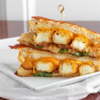 Over The Top Grilled Cheese · This one is for all the cheese lovers! Parmesan-crusted sourdough loaded with provolone and ...