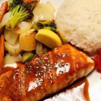 Salmon Teriyaki · Grilled salmon served over stir-fried vegetables (contains mushroom), topped with teriyaki s...