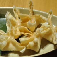 Crab Meat Cheese Wonton · 5 pieces. sweet sour sauce on the side.