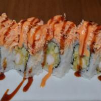 Paradise Roll · shrimp tempura, cucumber, avocado topped with spicy crab meat.  eel sauce.
