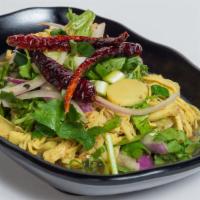 Ss10. Bamboo Shoot Salad · Shredded bamboo, ground roasted rice, red onion, green onion, mint, cilantro mixed in spicy ...