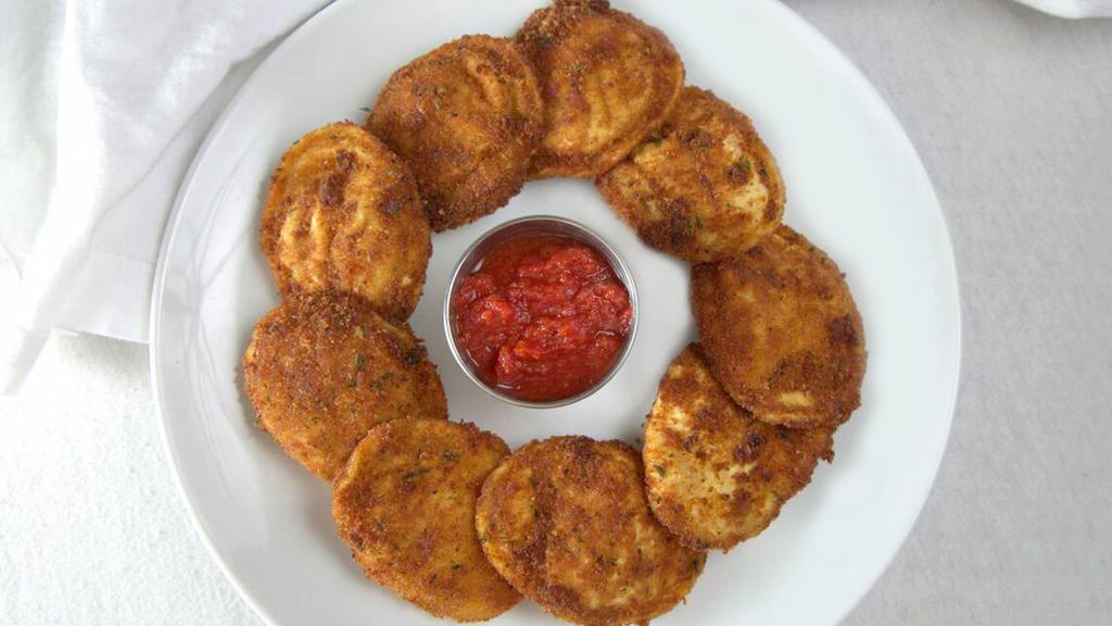 Fried Raviolis · Meat or cheese ravioli coated with egg and bread crumbs and fried. Served with homemade marinara sauce.