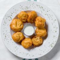 Battered Mushrooms · A generous portion of large, fresh mushrooms, battered and then fried.