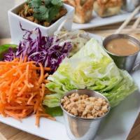 Thai Lettuce Wraps · (Build Your Own) . Carrots, red cabbage, bean sprouts, cilantro, peanuts, ginger peanut dres...