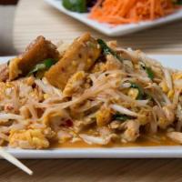 Khun Ma Pad Thai · Green cabbage, scallions, egg, bean sprouts, peanuts, tofu, rice noodles. This variation is ...