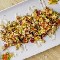 Crispy Brussel Sprouts · Grilled to perfection, topped with pine nuts, cranberries, and sweet and tangy poppy seed dr...