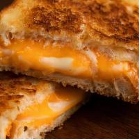 Tavern Grilled Cheese · Choice of 4 melted cheese, crispy applewood smoked bacon, juicy tomato, served on your choic...