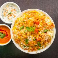 Veg Dum Biryani · Containing tender marinated meat or vegetables flavored with exotic spices cooked with basma...