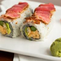Thai Kiss (10 Pc) · Red snapper tempura, asparagus, scallions, avocado, cheesy spicy crab mix, topped with seare...