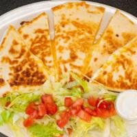Quesadilla Plate · Your choice of protein, side of rice and beans, side of sour cream.