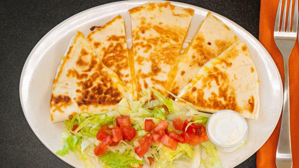 Quesadilla Plate · Your choice of protein, side of rice and beans, side of sour cream.