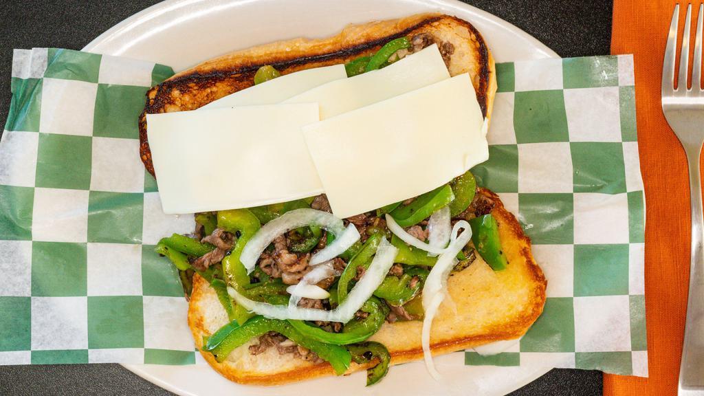 Philly Steak · Grilled onions and green peppers with melted American cheese on a toasted bun.