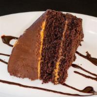 Galaxy Cake · Dark chocolate cake with caramel sauce under chocolate cream cheese mousse with chocolate co...
