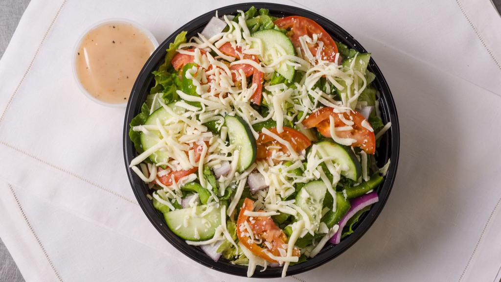 Italian Salad · A meal-size masterpiece with Genoa salami, ham, pepperoni, black olives, pepperoncini, mozzarella, and cheddar. All salads are prepared with dressing on the side.
