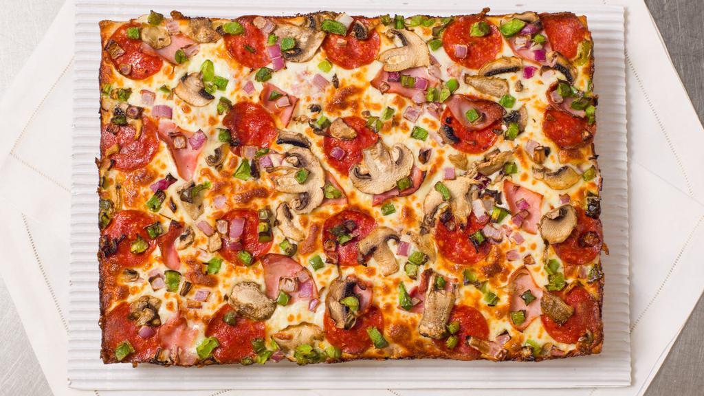 Deluxe Pizza (4 Corners) · Square Deep Dish. Pepperoni, ham, mushrooms, onions and green peppers.