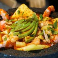 Molcajete De Los Reyes · Shrimp, octopus, crab, pineapple and scallops served in our house cocktail juice.