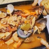 Caldo 7 Mares · Our homemade soup made with shrimp, fish, crab legs, clams, bell pepper, celery, potato, car...