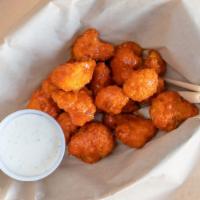 Fried Cauliflower · A healthy portion of breaded cauliflower, crispy fried, tossed with Buffalo Sauce and served...