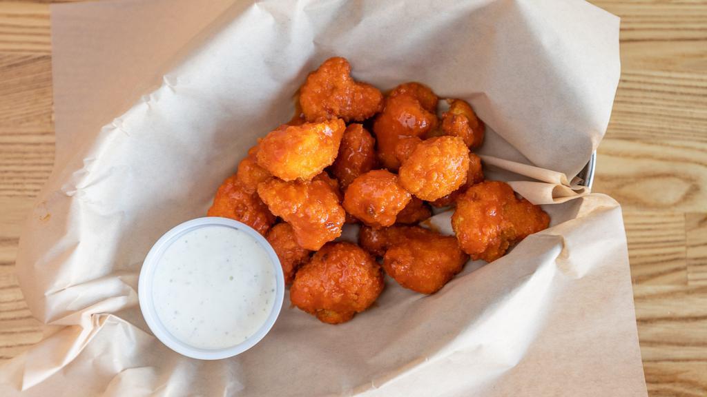 Fried Cauliflower · A healthy portion of breaded cauliflower, crispy fried, tossed with Buffalo Sauce and served with Ranch or Bleu Cheese Dressing