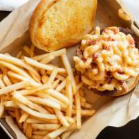 Bacon Mac N Cheese Burger · Our signature all beef patty topped with your childhood favorite, mac n' cheese. Finished of...