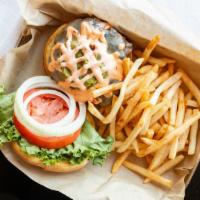 California Burger · Our fresh patty topped with pepper jack cheese, homemade guacamole and roasted red bell pepp...