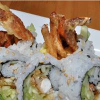 Spider Roll · deep fried soft shell crab, cucumber, avocado topped tobiko.